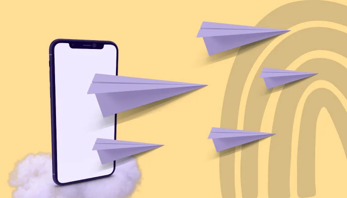 Vários aviãozinhos de papel saindo da tela de um smartphone.
