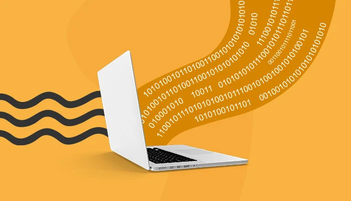 Imagem: Vários números 1 e 0 saindo de um notebook.