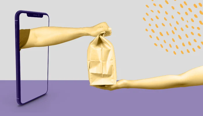 Uma mão sai de um smartphone e entrega uma sacola para outra mão, representando relações de troca.