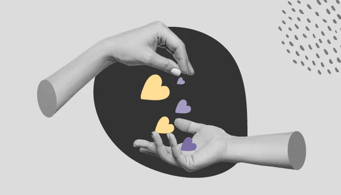 Duas mãos passando corações uma para a outra.